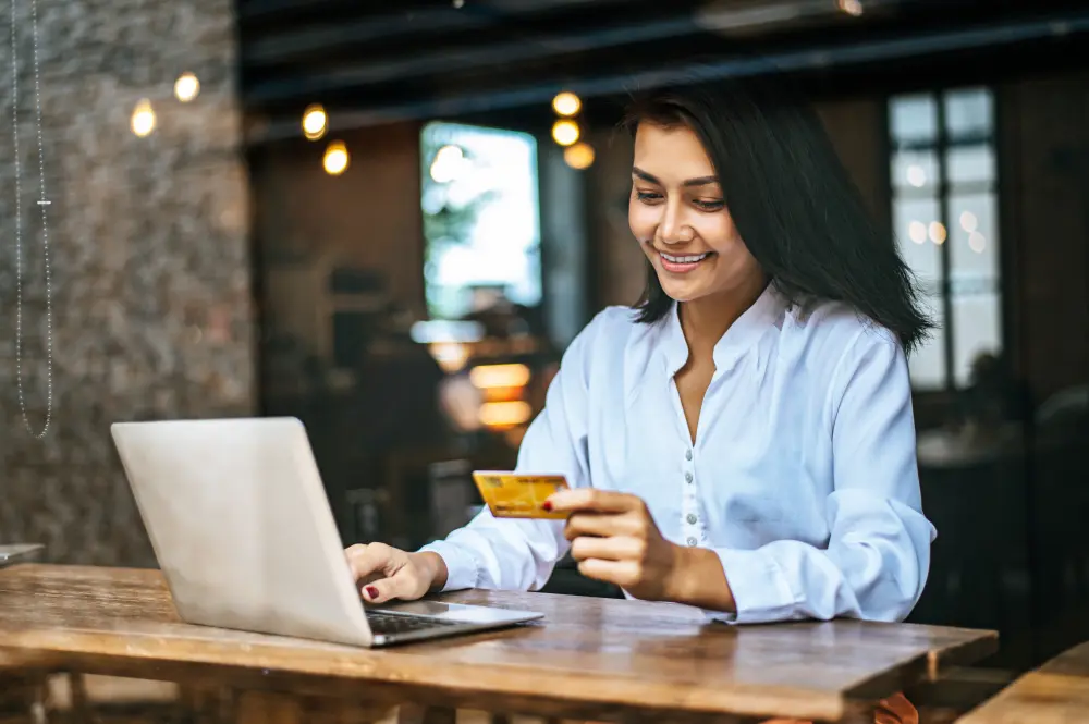 woman paying online with credit card